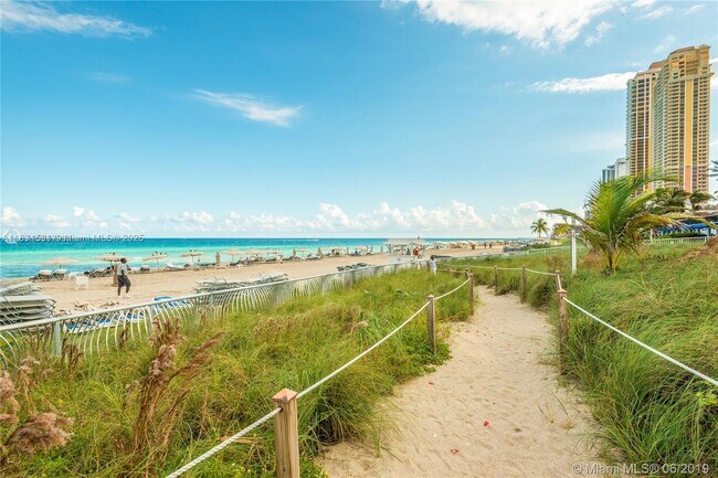 Building Photo - 18201 Collins Ave