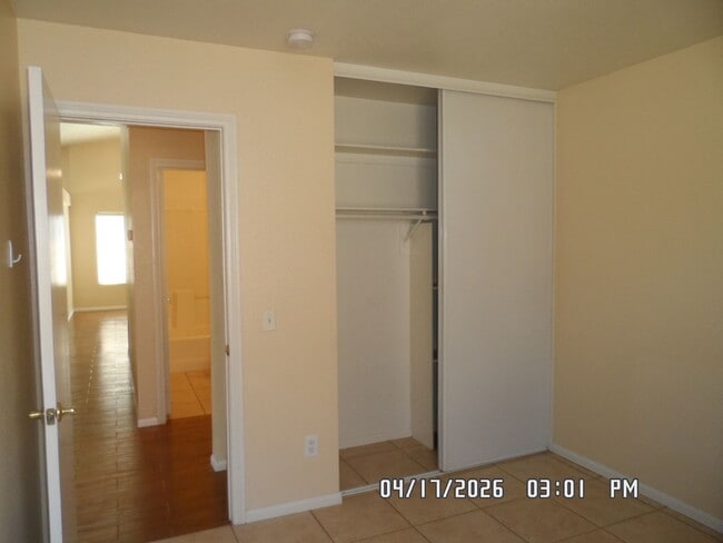 Building Photo - 3 Bedrooms, 2 Bathrooms, approx. 1392 sq. ft., 2 Car Garage, Covered Patio, Fenced, Play house,