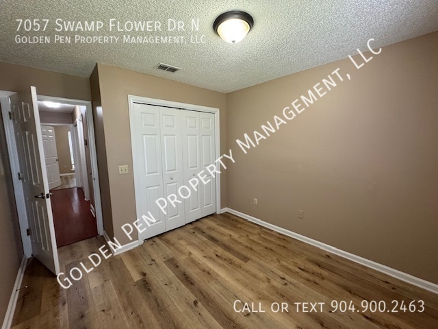 Building Photo - 7057 Swamp Flower Dr N