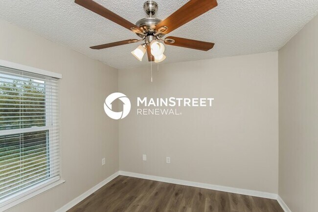 Building Photo - 4 Bedroom Pet-Friendly Home in Palm Bay, FL with Main Street Renewal