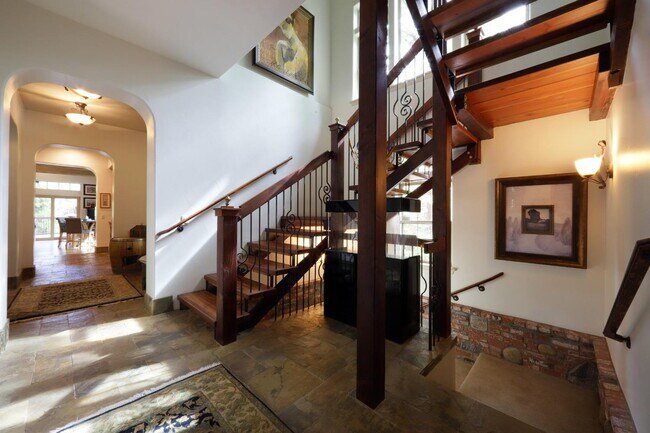 Building Photo - Don't miss this amazing opportunity to rent a higher end home nestled in the trees in the coveted...