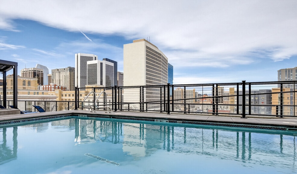 Resort-style living, right outside your door at your rooftop pool. - 20th Street Station