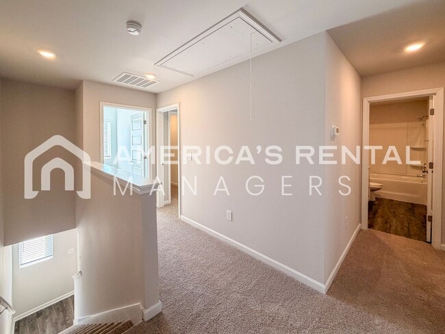 Building Photo - Stylish two level home with open concept l...