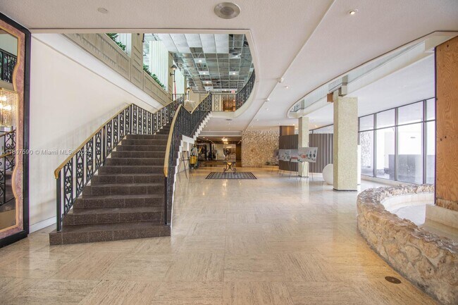Building Photo - 5555 Collins Ave