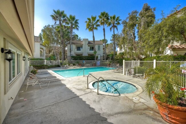 Building Photo - Coastal Living at Its Best – Upgraded 1BR Condo with Private Patio & Resort-Style Amenities