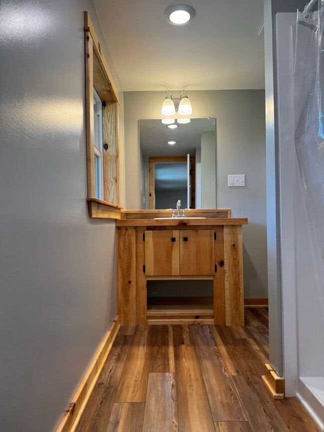 Building Photo - Exquisite Brick Ranch with Modern Upgrades, Countryside Charm And Two Car Garage