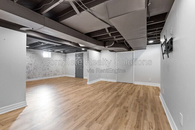 Building Photo - 8511 Florence Ave