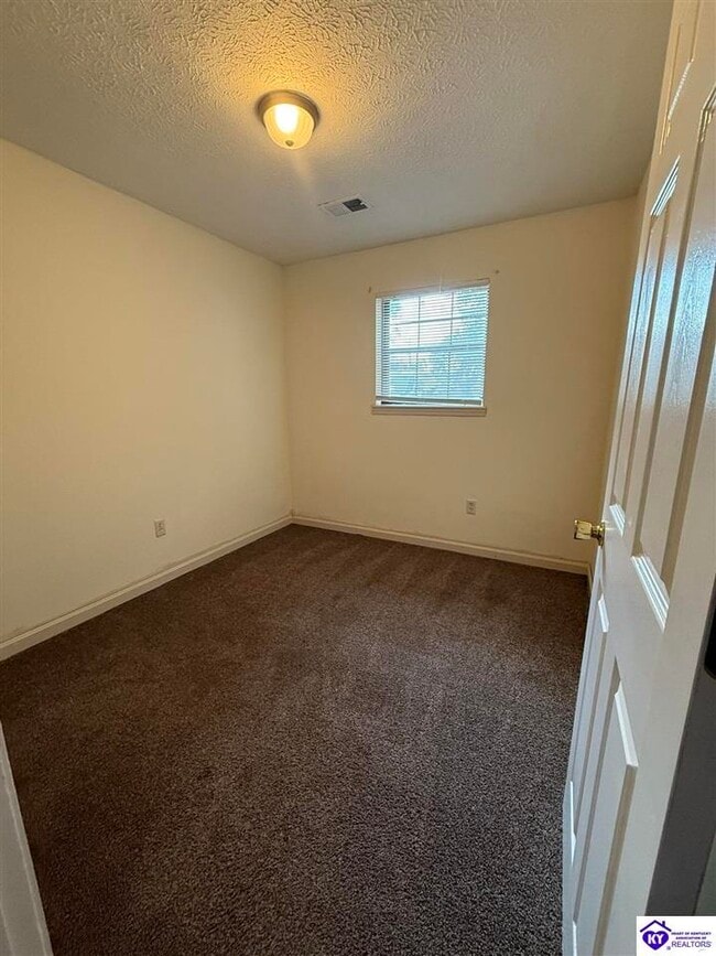 Building Photo - 105 Candy Ct