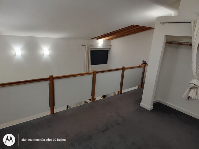 PORTION OF LOFT WITH CLOSET & BANNISTER - 213 N Avenue 63