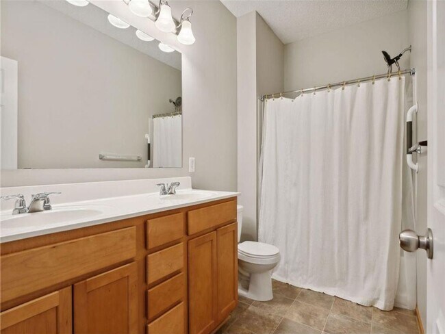 Building Photo - Upscale Townhome with Large Office-Loft, 3 Baths, 2-Car Attached Garage, Quartz Countertops and M...