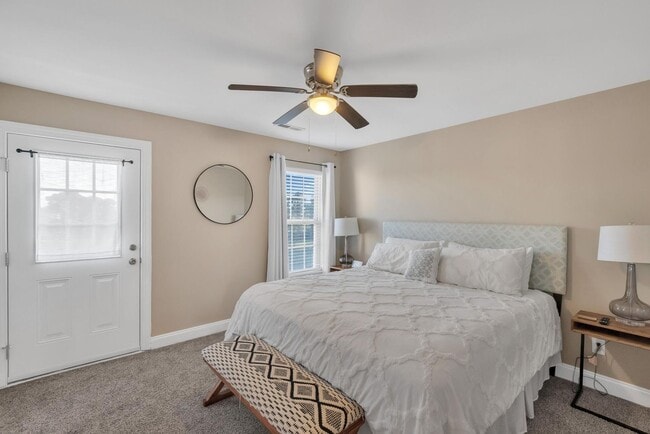 Building Photo - Updated coastal townhome- fully furnished!