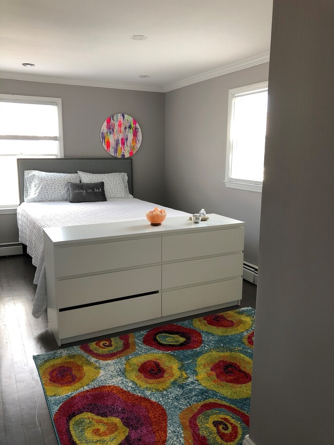 Bedroom 1 (Queen) - Beach views with closet and dresser - 840 E Broadway