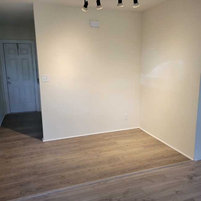 dining area with new flooring - 2031 NE 56th St