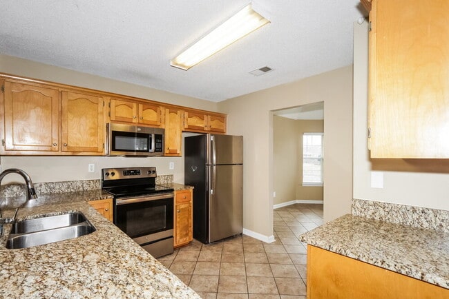 Building Photo - 8929 Bent Grass Loop E