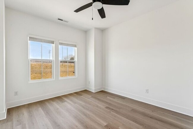 Building Photo - High-End 2BR Townhome | Rooftop Terrace + 2-Car Garage | 24-Unit Community