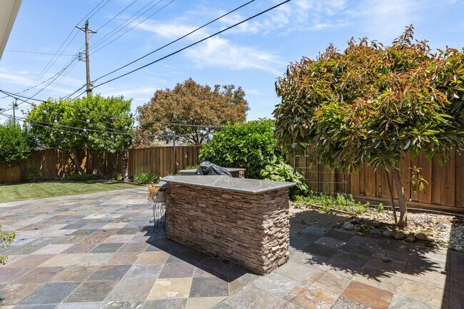 Building Photo - Private Oasis with a new price