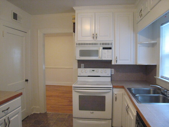 Kitchen to dining room view. - 1911 E 4th St