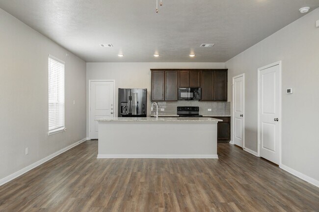 Building Photo - Spacious Townhome Available Now!