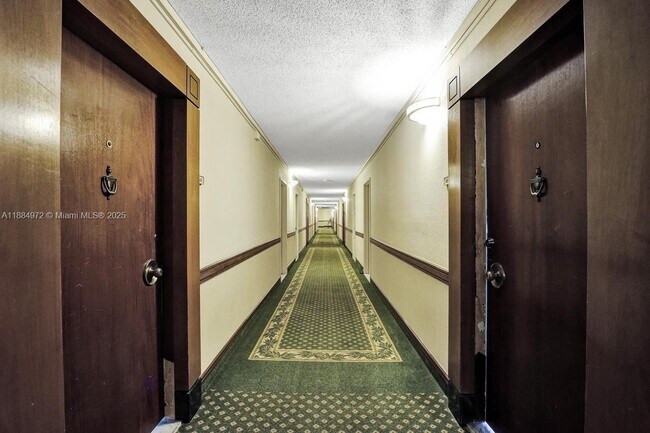 Building Photo - 5555 Collins Ave