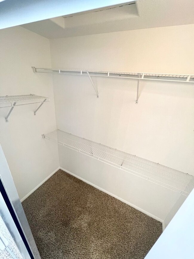 Building Photo - 2 Bedroom 2 Bath Condo with attached garage!