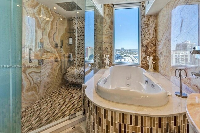 Building Photo - 16699 Collins Ave