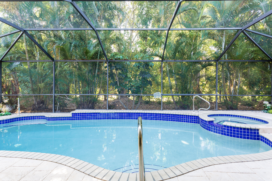 The pool is heated for comfortable swimming depending on ambient air temps & weather conditions. - 22143 Seashore Cir