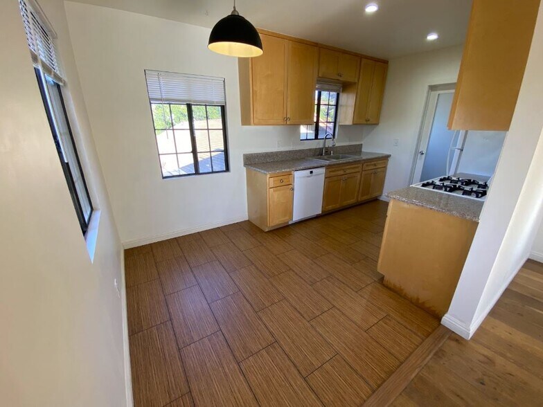 Separate dining space adjacent to the front door/living room area/kitchen. - 1733 Phillips Way