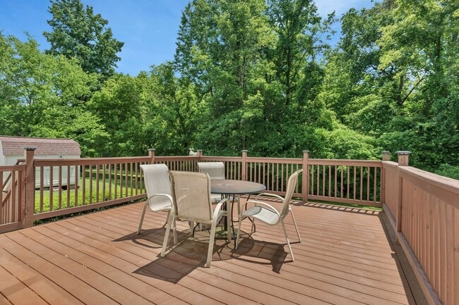 Building Photo - One acre lot with first floor suite in bea...