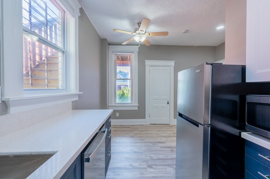 view from kitchen into open concept living room - 304 Warner St