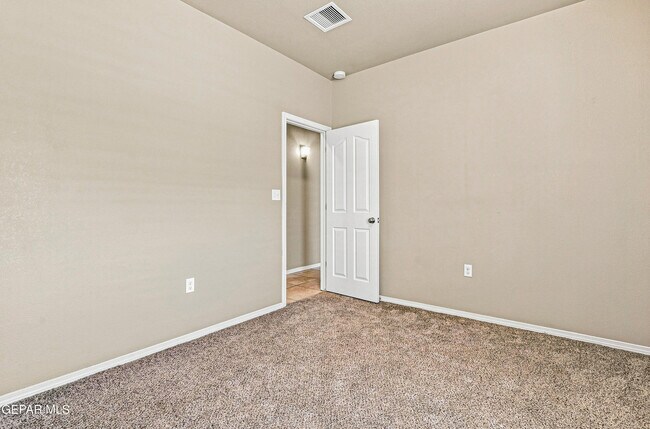 Building Photo - 7008 Faxon Dr