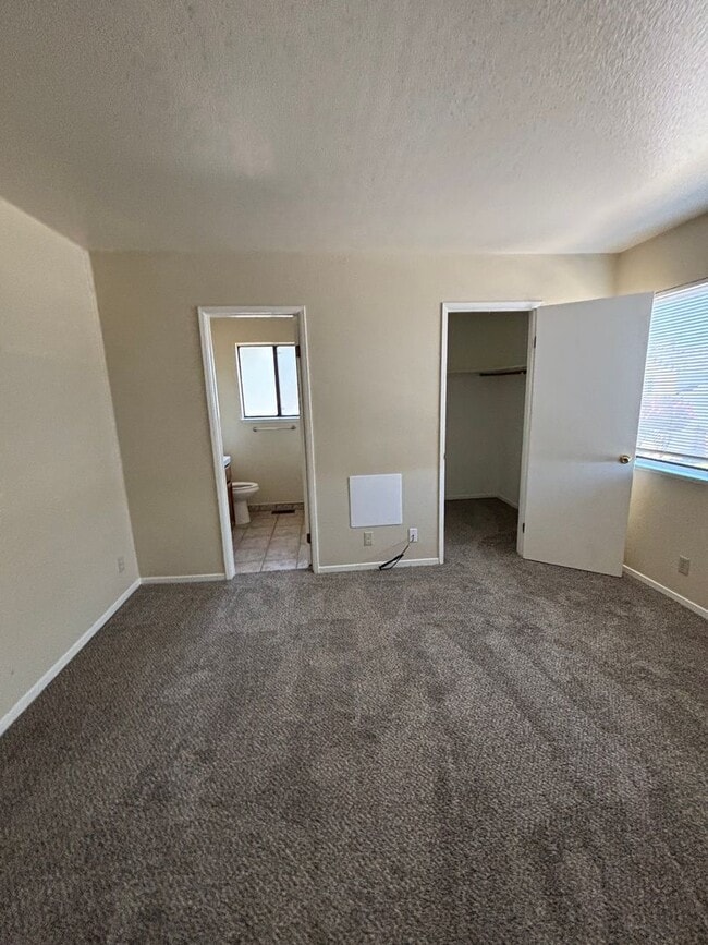 Building Photo - Spacious 4-Bedroom Home with Community Poo...