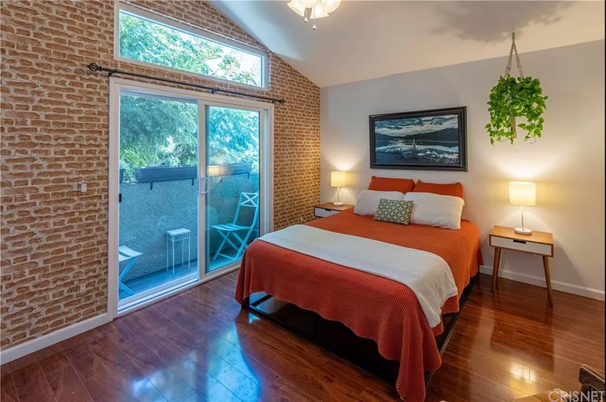 Front bedroom with balcony. - 1554 N Hobart Blvd