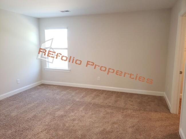 Building Photo - Charming 4 Bedroom, 2.5 Bath, 2-Car Garage...