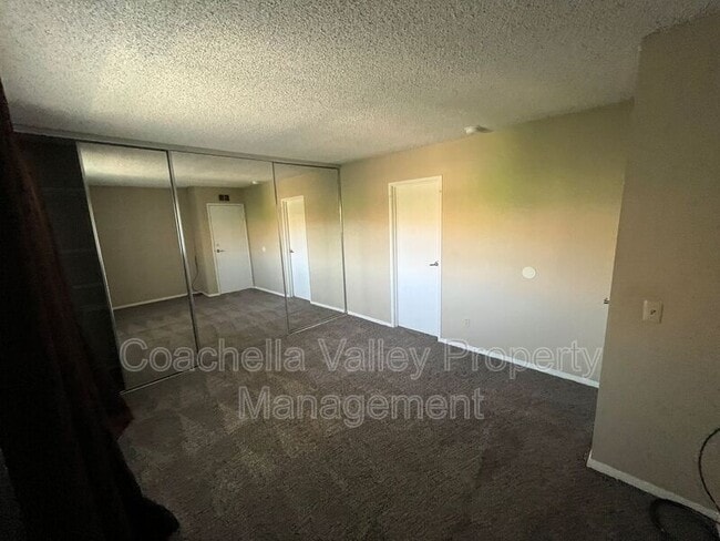 Building Photo - 1950 S Palm Canyon Dr