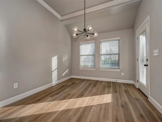 Building Photo - Modern 4-Bed, 2-Bath Mustang Home with 3-Car Garage!