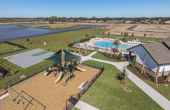 Building Photo - MOVE IN SPECIAL-Gorgeous Energy Efficient 4/2 Home in Gated Community Close to Lake Nona