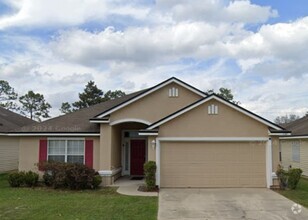 Building Photo - 4 Bedroom 2 Bath Brick and Stucco in desir...