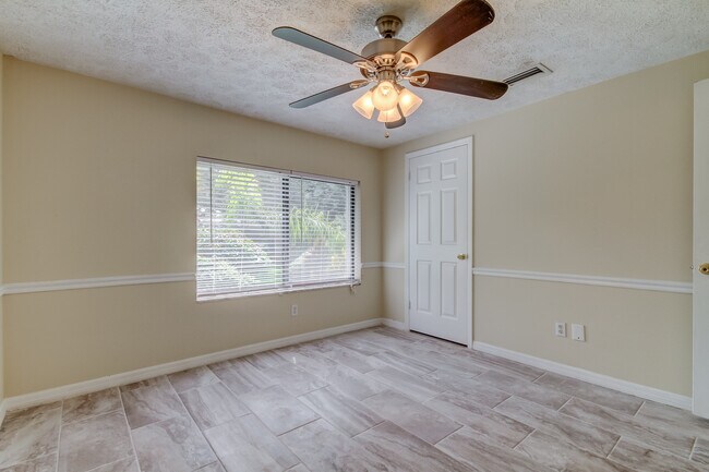 Building Photo - 10406 Reclinata Ln