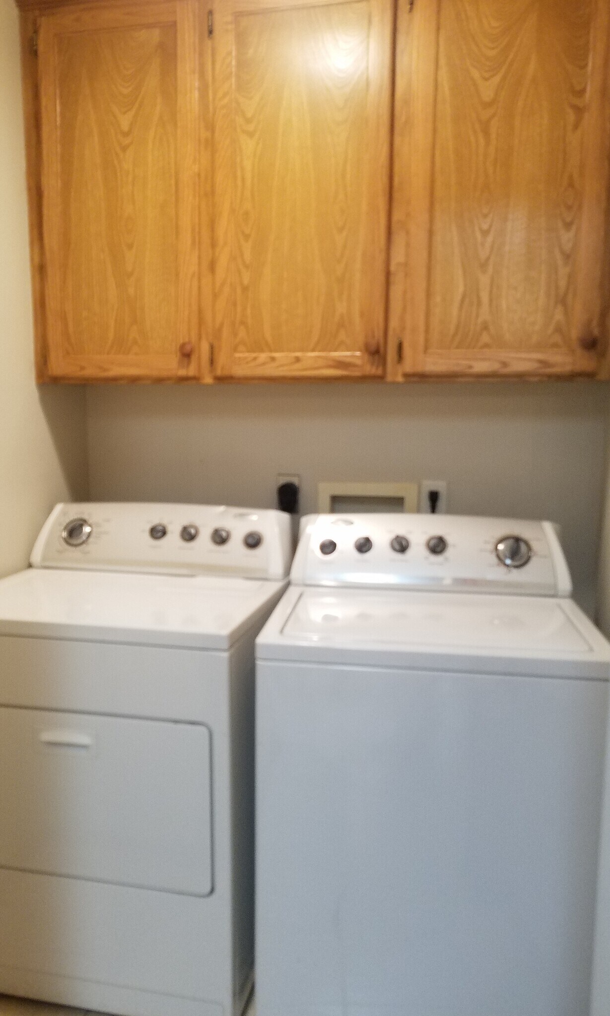 enclosed Laundry room with cabinet storage - 5119 Galloping Way