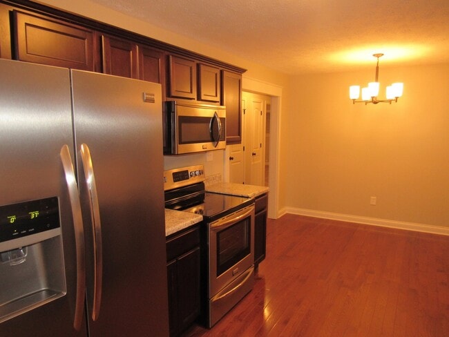 Building Photo - 4 Bedroom, 3 Bath Basement Ranch with Coun...