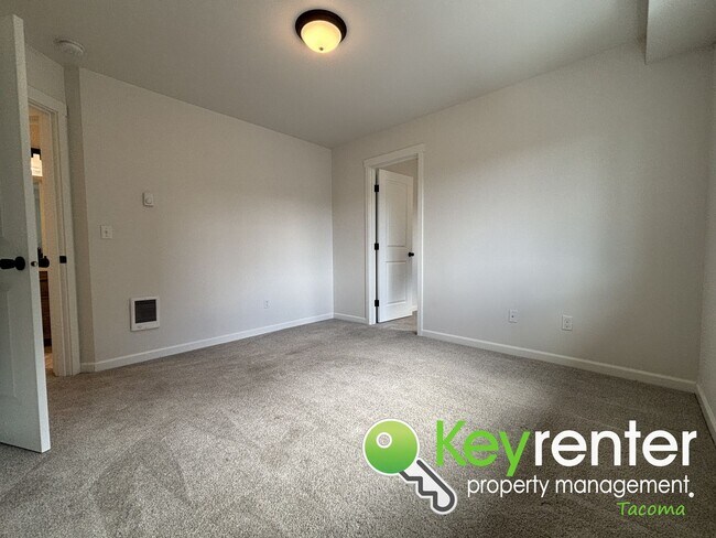 Building Photo - Stylish 4-Bedroom Home with Finished Basem...