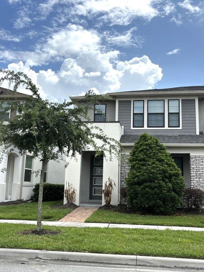 Building Photo - Modern 3/2.5 Townhouse located in the Tapestry Community of Kissimmee