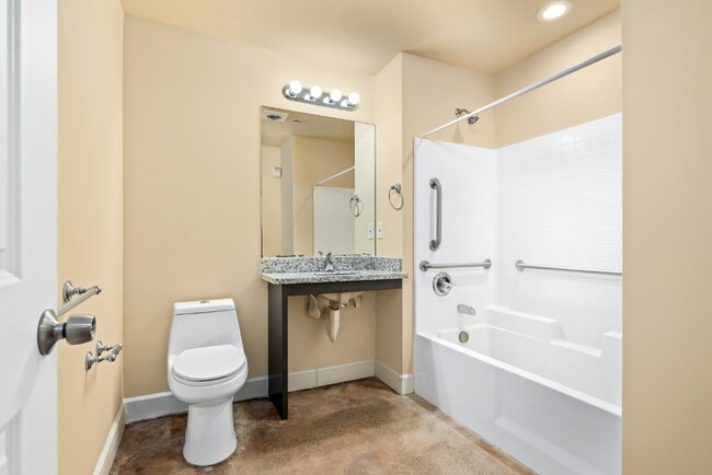 Building Photo - Refined Studio Living at Marigold Apartments — Available Now