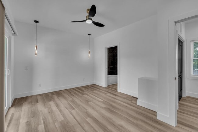 Building Photo - Modern New Construction Townhome with Roof...