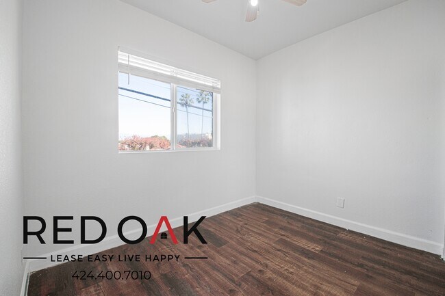 Building Photo - 1847 1/2 W Florence Ave