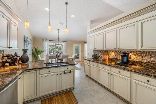 Building Photo - "Coastal Elegance Awaits: Spacious 4-Bed Oasis with Granite Touches on Shipwreck Road"