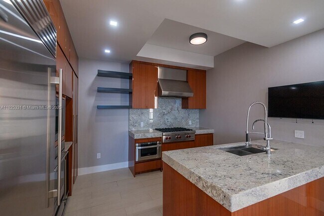 Building Photo - 9701 Collins Ave