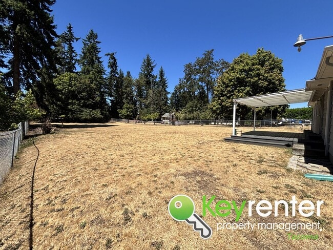 Building Photo - Updated 3 Bedroom Home with Huge Backyard ...