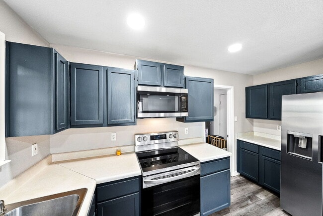 Building Photo - A Waterfall Shower, a Sunroom, and a Story Worth Coming Home To
