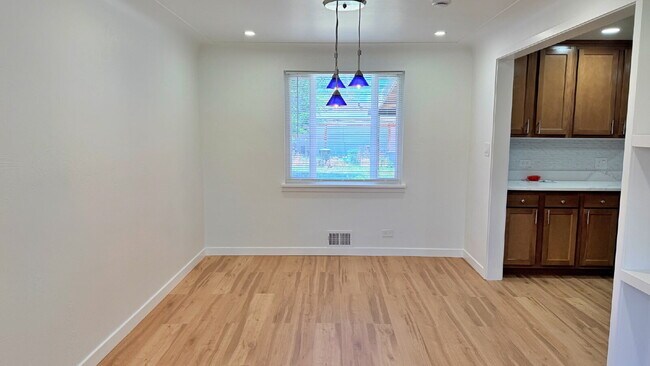 Building Photo - FANTASTIC REMODELED 3 Bed 2 Bath Home in Strayer & Shephards Park Hill Brand New Flooring New Car...